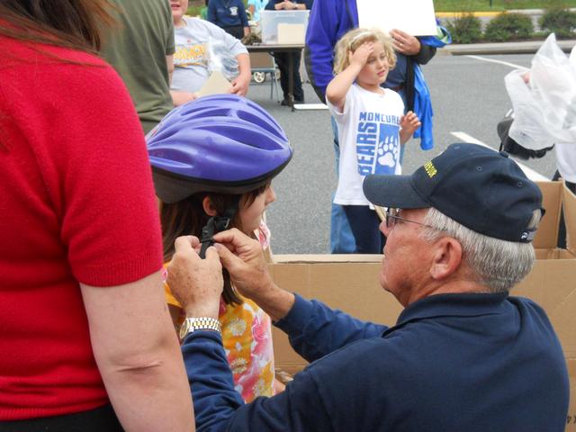 Mike fits a child with a new bike helmet

Save Your Heart For Love  May 2010